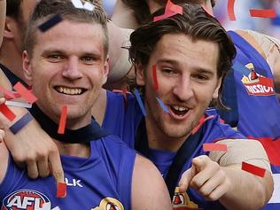 2016 AFL Grand Final match between the Western Bulldogs and the Sydney Swans at the Melbourne Cricket Ground (MCG), Melbourne, Australia on October 1, 2016. Jordan Roughead celebrates on the podium Picture :Wayne Ludbey