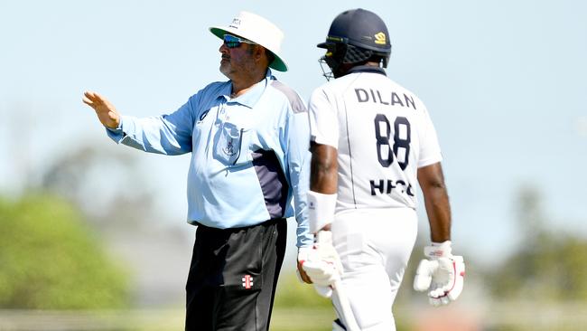 Umpire in control. (Photo by Josh Chadwick)