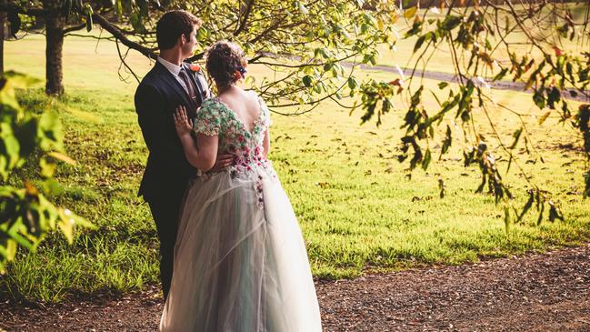 Love struck: Liana Crosdale (now Burmeister), Matt Burmeister. Brody Grogan Photography