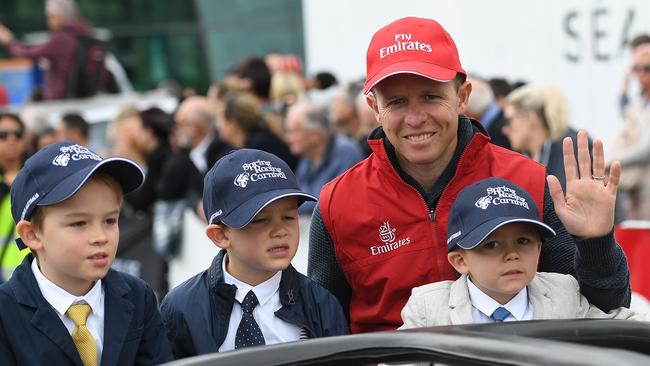 SA jockey Kerrin McEvoy with his children during the Melbourne Cup Parade. Picture: AAP / Julian Smith