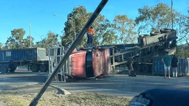 A road train has flipped on the Bruce Hwy in Stuart on Saturday afternoon. Picture: Facebook