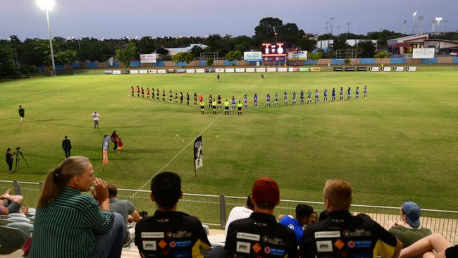 Hellenic Athletic Women and NT Yapas prepare to kick off at the Darwin Football Stadium last night in front of spectators — the first in Australia allowed back to watch organised team sport since COVID-19 restrictions were put in place. Picture: Natasha Emeck