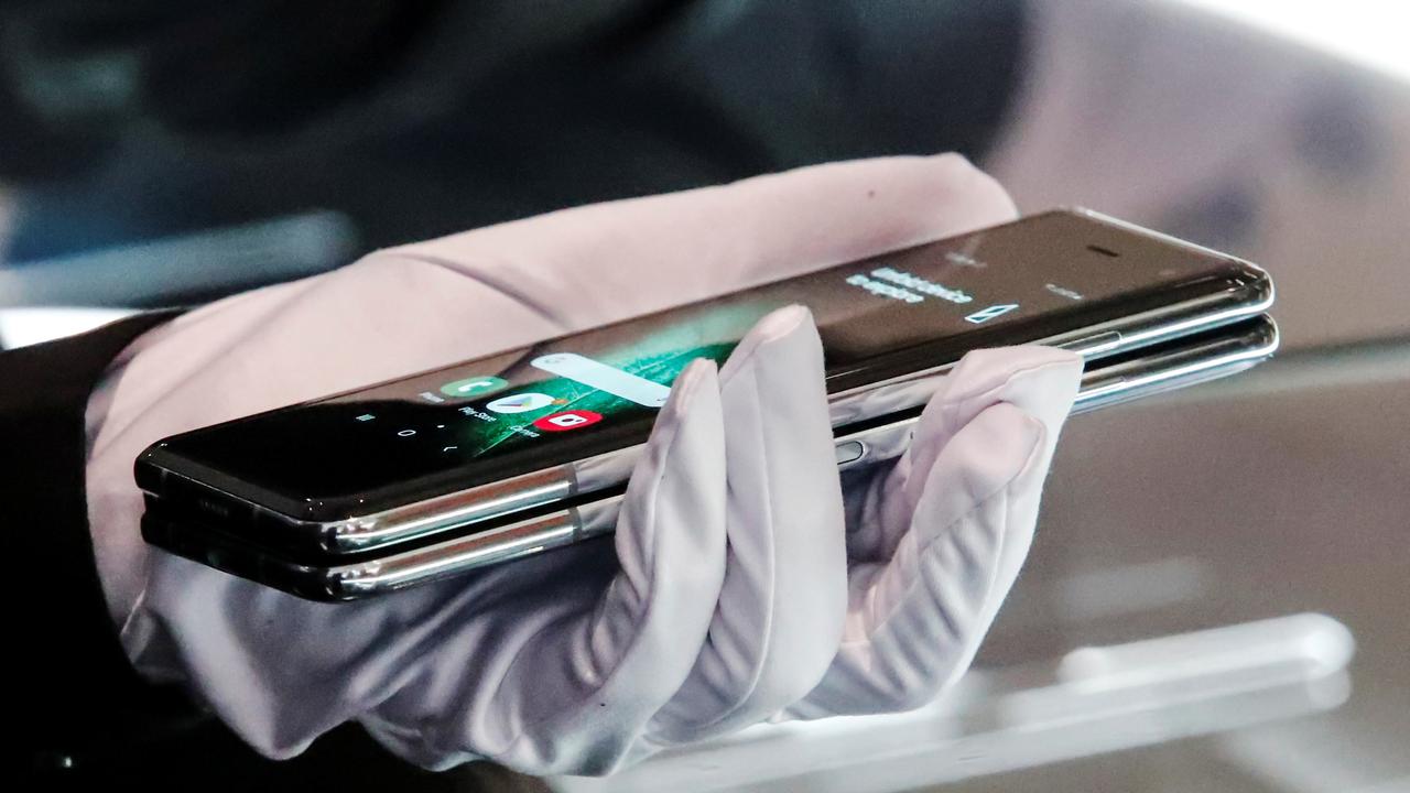 You might want to leave the gloves on or risk damaging the fragile phone. Picture: Reuters / Hannibal Hanschke