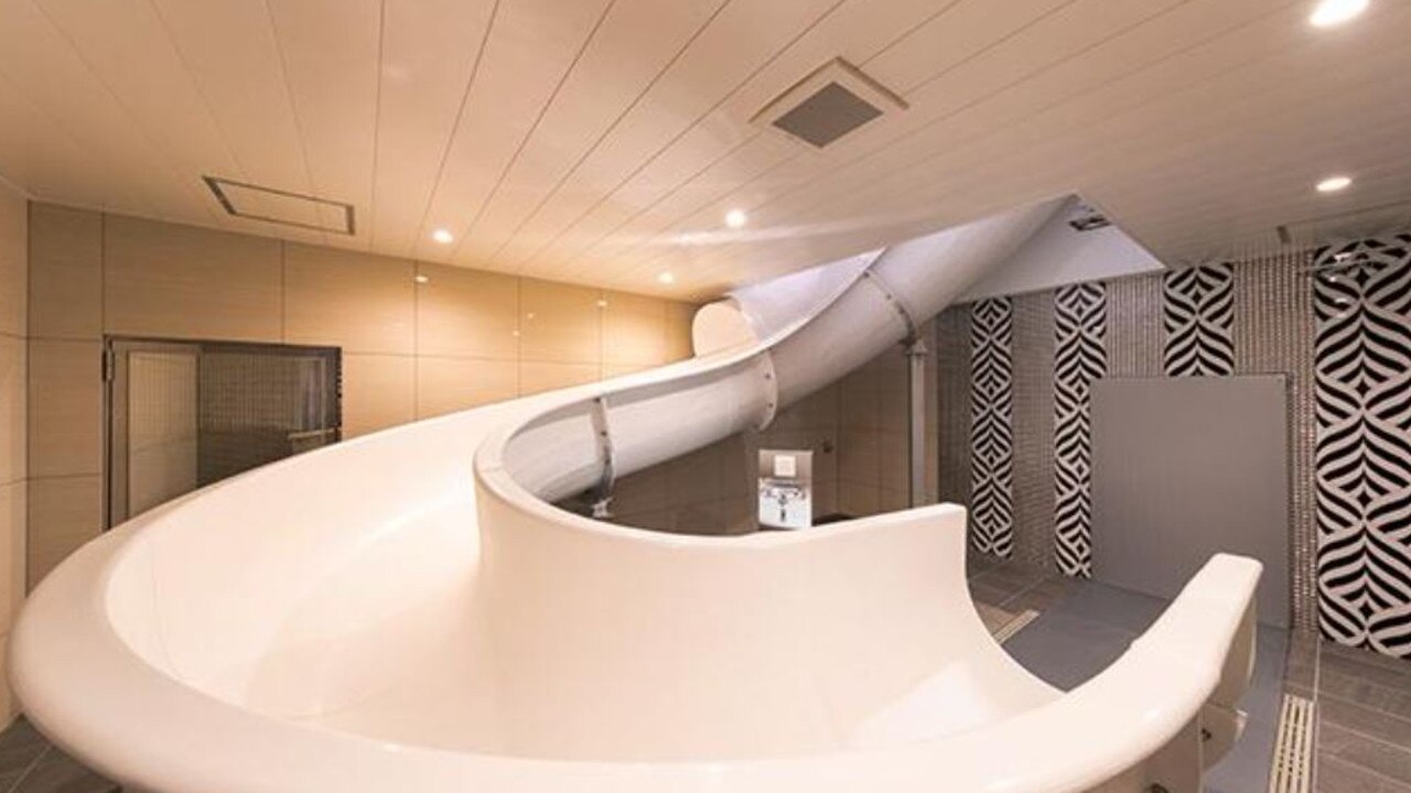 One room at Hotel Eldia even comes with a slide that ends in the bathroom. Picture: Best Delight Hotels