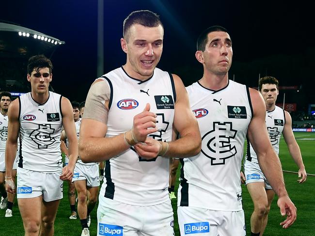 ADELAIDE, AUSTRALIA - APRIL 13:Patrick Cripps of the Blues leads his team off after their loss during the round five AFL match between Adelaide Crows and Carlton Blues at Adelaide Oval, on April 13, 2023, in Adelaide, Australia. (Photo by Mark Brake/Getty Images)