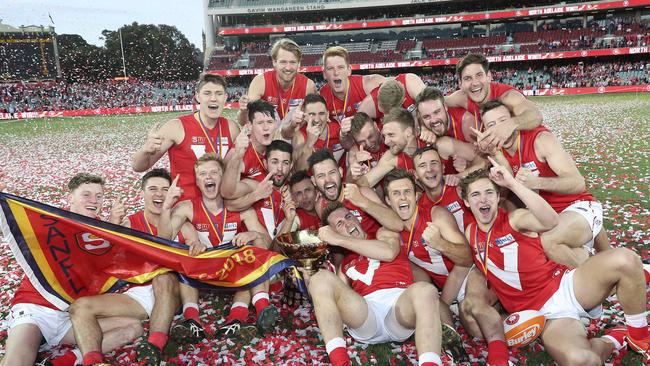 North Adelaide players celebrate after winning the club’s first premiership since 1991.<br/>Picture: Sarah Reed