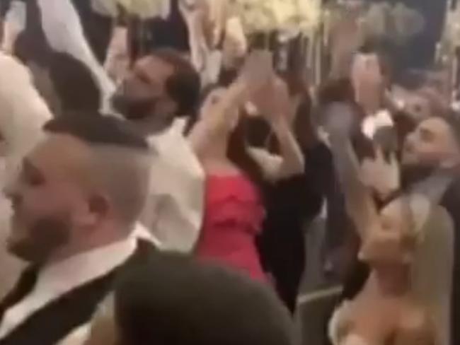 Pictured are dozens of people allegedly attending a wedding in western Sydney without any form of social distancing in place, and all dancing and touching one another. Picture: Sunrise