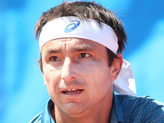 Marinko Matosevic (Australia) playing Peter Polansky (Canada). ATP Challenger, at Happy Valley Tennis Club. 04/01/16 Picture: Stephen Laffer