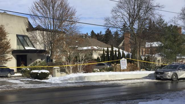 Police tape surrounds the Toronto home of billionaire Barry Sherman. Pic: AP