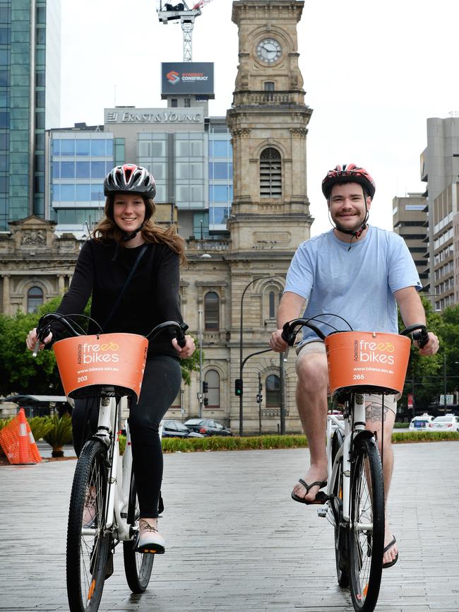 Victorian couple Hannah Smith and Jack Kilmer riding the bikes in Victoria Square.