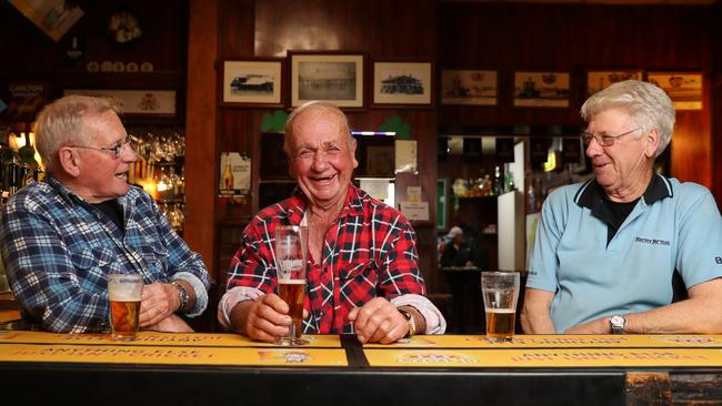 Great mates Peter Brewer, Bert McMahon and Lester Murphy at the Boorowa Hotel. Picture: Jonathan Ng