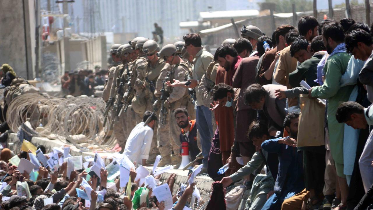 The US’ withdrawal from Kabul was chaotic as Afghans desperately tried to board planes and a suicide bombing killed 13 soldiers. Picture: EPA/AKHTER GULFAM