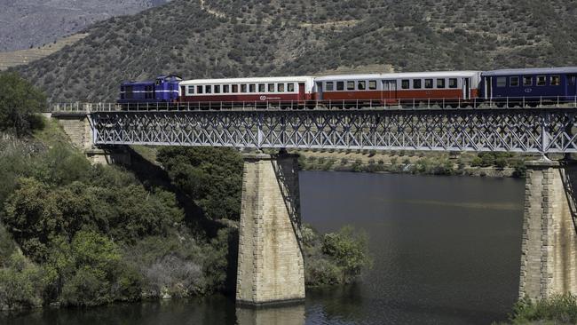 Vineyards are among the sights seen by train in Portugal’s Douro Valley.