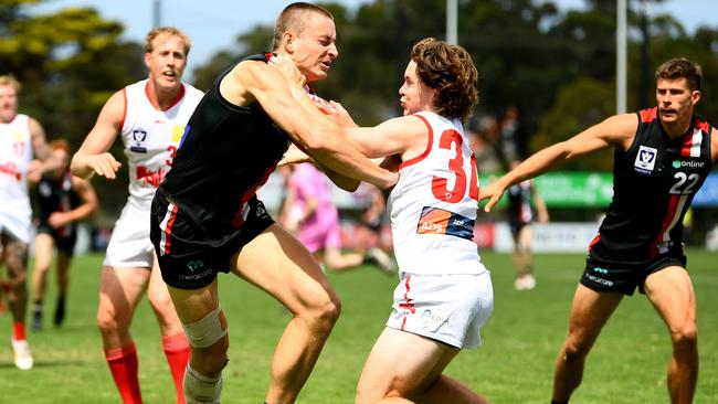 Angus Grant of Frankston is tackled by Sam Donegan of the Northern Bullants during a VFL practice match. (Photo by Josh Chadwick/AFL Photos/via Getty Images )