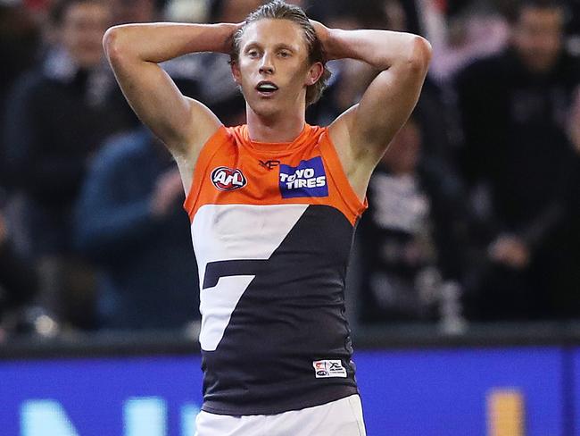 Dejected Giants Lachie Whitfield during AFL Semi Final match between the GWS Giants v Collingwood at the MCG. Picture. Phil Hillyard