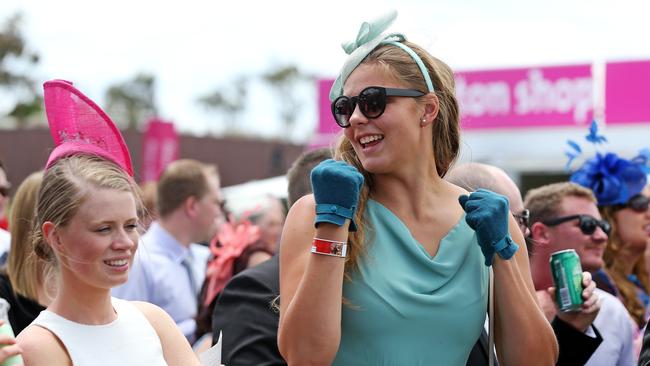 A race fan celebrates a win.