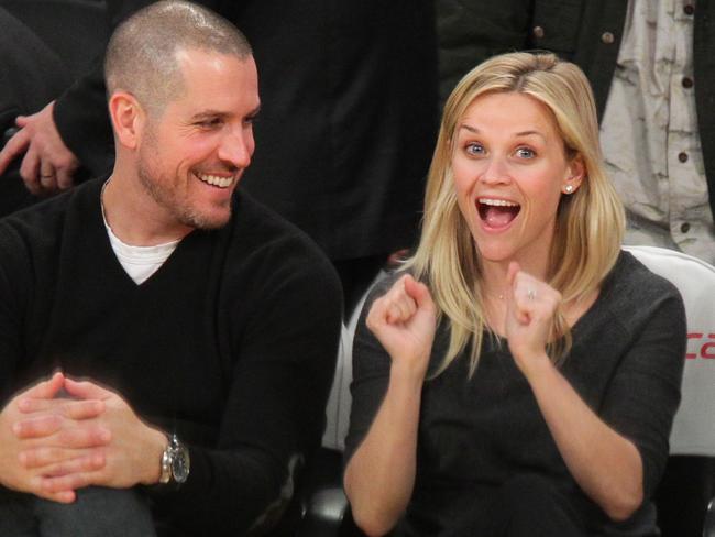 Jim Toth (L) and Reese Witherspoon in 2011. Picture: Getty