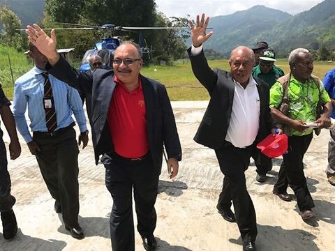 2017 - Papua New Guinea PM Peter O'Neill (L)  and former PNG judge Don Sawong. Supplied