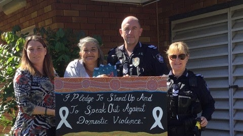 Former Mount Garnet police sergeant Lee Adam Golding, pictured here at a presentation ceremony in 2020, was said by his barrister to be a caring member of the small Tablelands community, who was passionate about preventing domestic violence and seeking justice for victims.