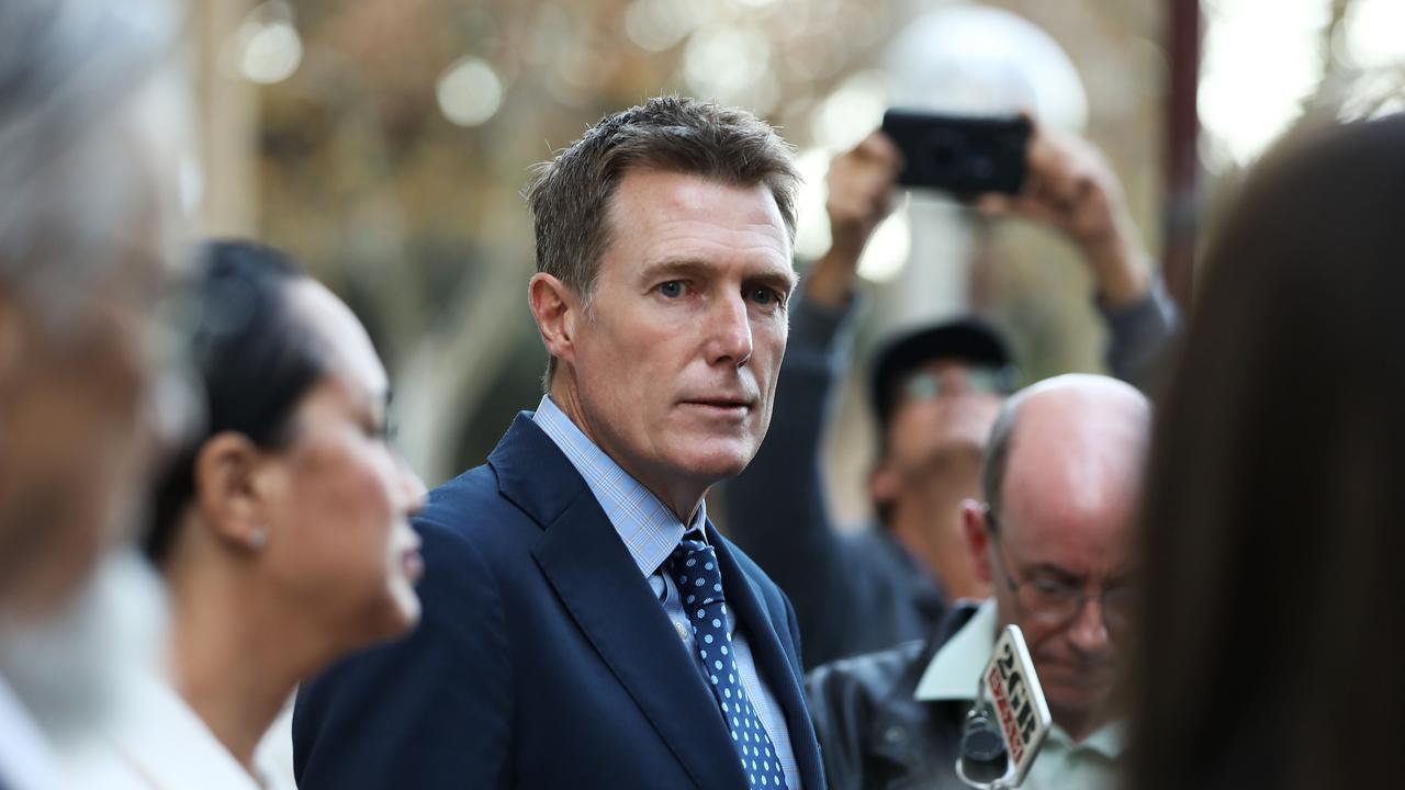 Christian Porter speaking at a press conference with his lawyer Rebekah Giles outside the Supreme Court after dropping his claims against the ABC for defamation. Picture: Jane Dempster/The Australian