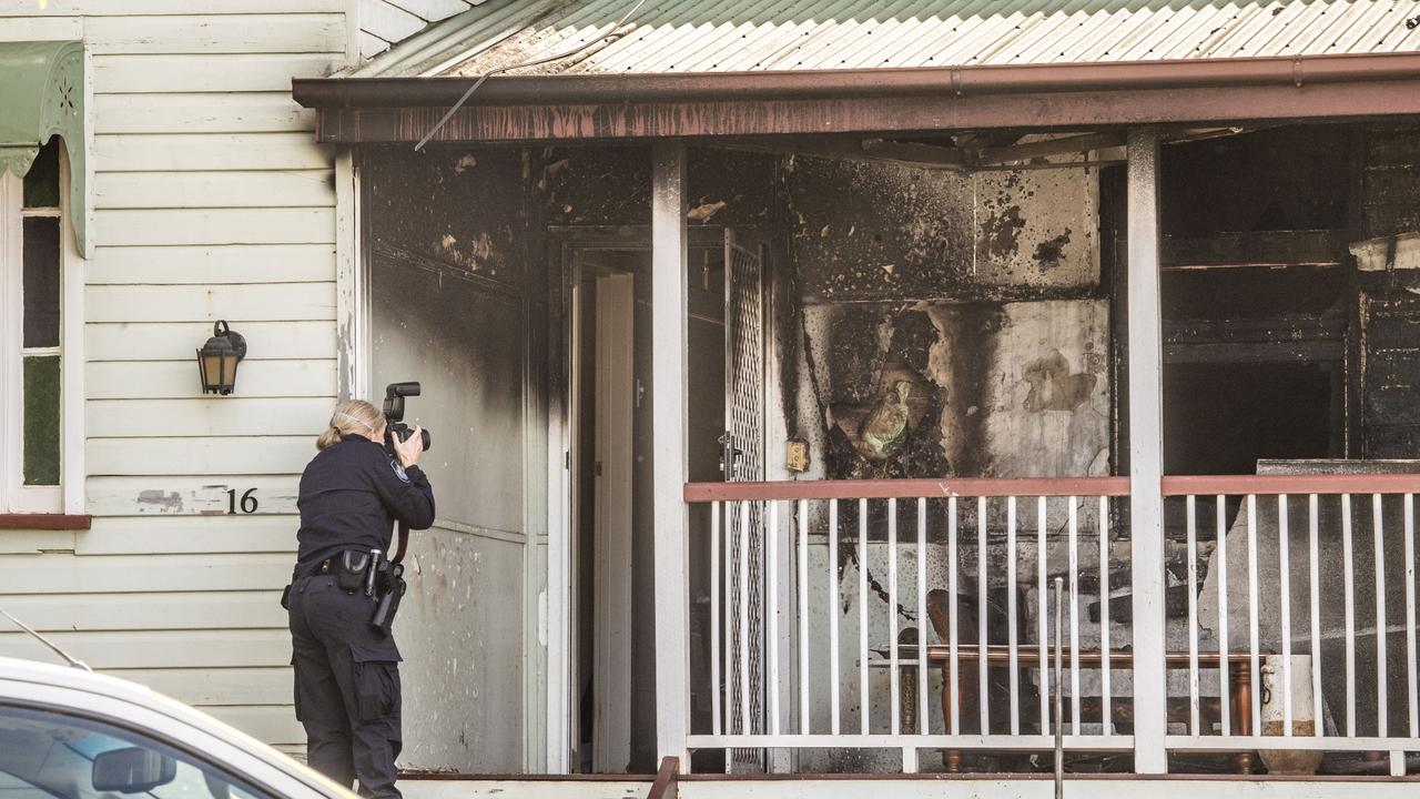 QFES fire investigation and QPS scenes of crime investigate a house fire in Link St, North Toowoomba. Starting around 5am on New Year's Day, 3 occupants escaped without injury. Sunday, January 1, 2023. Picture: Nev Madsen.