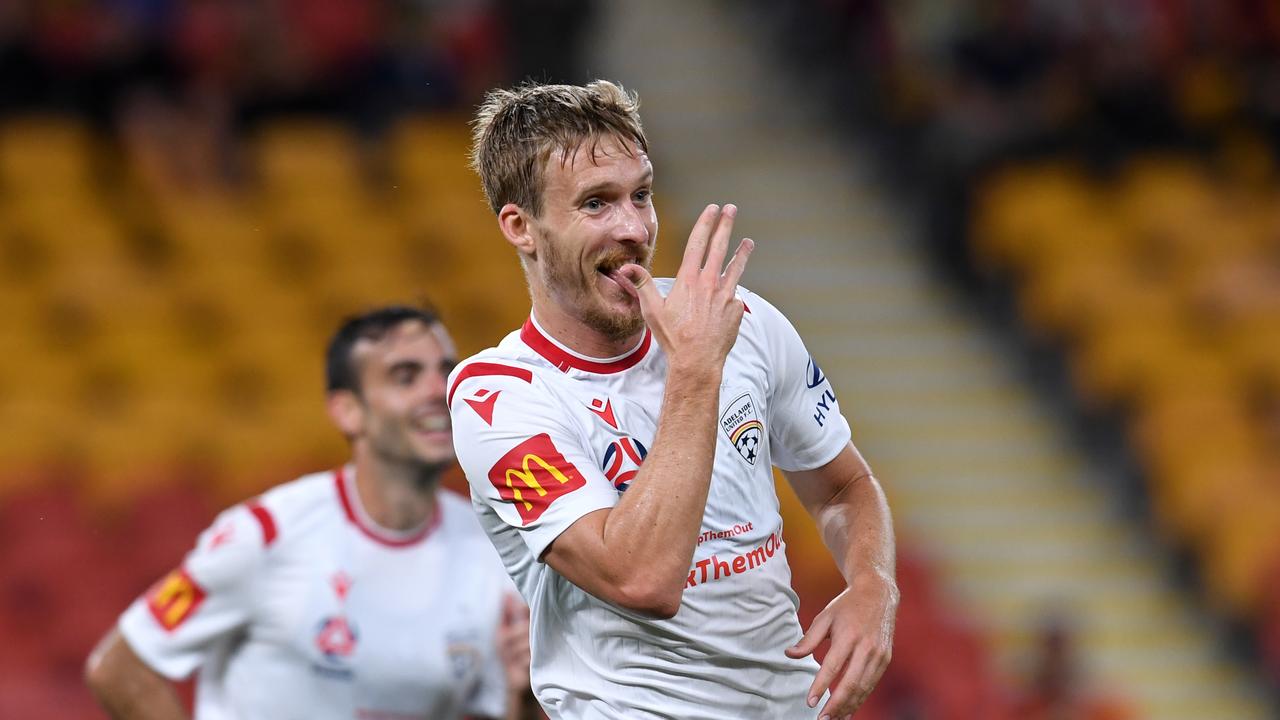 Ben Halloran scored a screamer for Adelaide United but it wasn’t enough for the Reds.