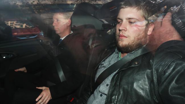 Jaymes Todd being escorted by police into the Melbourne Magistrate Court after his arrested in June 2018. Picture: AAP