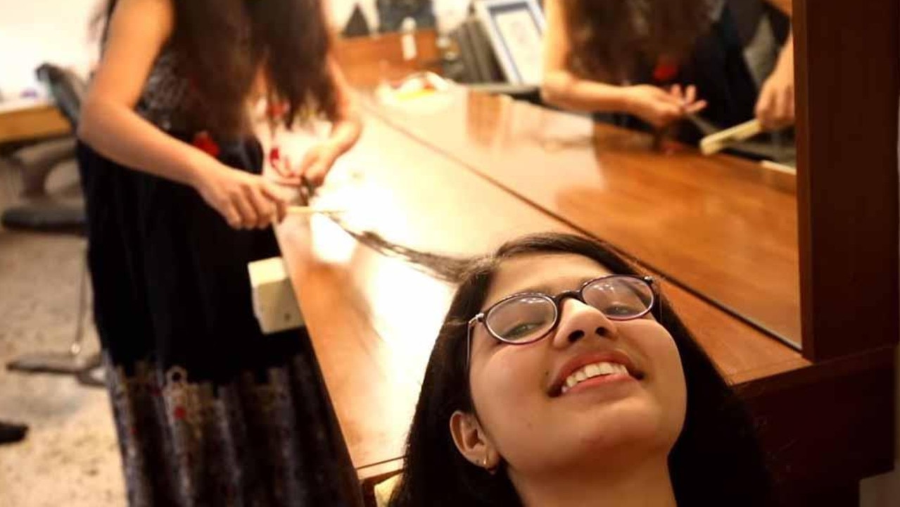 Nilanshi Patel needs a lot of help from her mother to wash, dry and style her hair. Picture: Guinness World Records