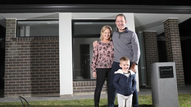 Adam Moore and Rebecca Dawson-Moore with Archie, 3, at their Findon house. Picture: Dean Martin