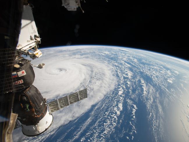 This NASA handout image obtained August 3, 2017 shows Super Typhoon Noru photgraphed by NASA astronaut Randy Bresnik in the Northwestern Pacific Ocean on August 1, 2017, as the International Space Station passed overhead, sharing images of the massive storm on social media, writing, "Super Typhoon #Noru, amazing the size of this weather phenomenon, you can almost sense its power from 250 miles above."    As of 11 a.m. EDT on August 1, the storm was centered near 24.7 degrees north latitude and 137.0 degrees east longitude, with maximum sustained winds near 90 knots. By August 2 at 5 a.m. EDT, the maximum sustained winds were near 100 knots. NASA satellites are keeping track of the typhoon as it continues its slow trek through the Pacific toward southwestern Japan. / AFP PHOTO / NASA / Randy BRESNIK / RESTRICTED TO EDITORIAL USE - MANDATORY CREDIT "AFP PHOTO /NASA/RANDY BRESNIK" - NO MARKETING NO ADVERTISING CAMPAIGNS - DISTRIBUTED AS A SERVICE TO CLIENTS