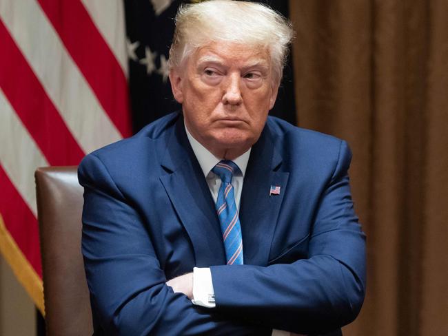 US President Donald Trump listens during a roundtable meeting on seniors in the Cabinet Room at the White House in Washington, DC, June 15, 2020. - President Donald Trump holds a roundtable discussion with senior citizens called âFighting for Americaâs Seniorsâ on Monday. (Photo by SAUL LOEB / AFP)