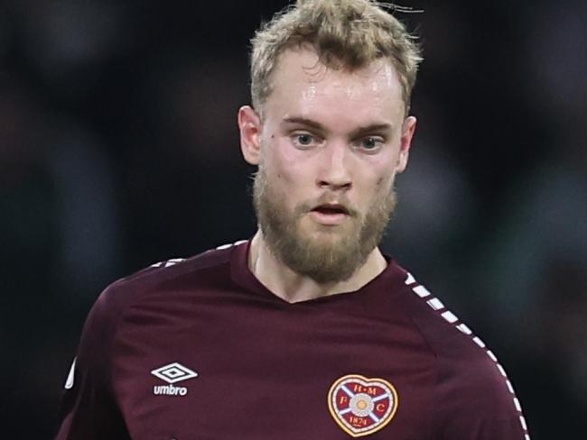 GLASGOW, SCOTLAND - DECEMBER 16: Nathaniel Atkinson of Hearts controls the ball during the Cinch Scottish Premiership match between Celtic FC and Heart of Midlothian at Celtic Park Stadium on December 16, 2023 in Glasgow, Scotland. (Photo by Ian MacNicol/Getty Images)