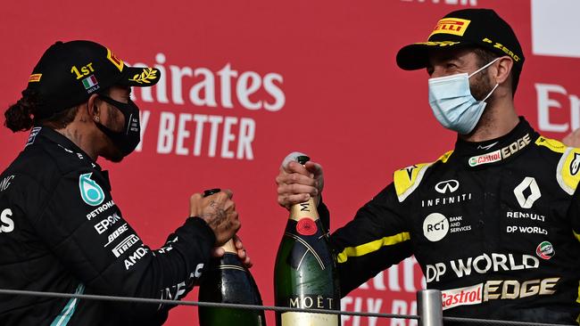 Race winner Lewis Hamilton of Great Britain and Mercedes GP and third placed Daniel Ricciardo of Australia and Renault Sport F1. Picture: Miguel Medina