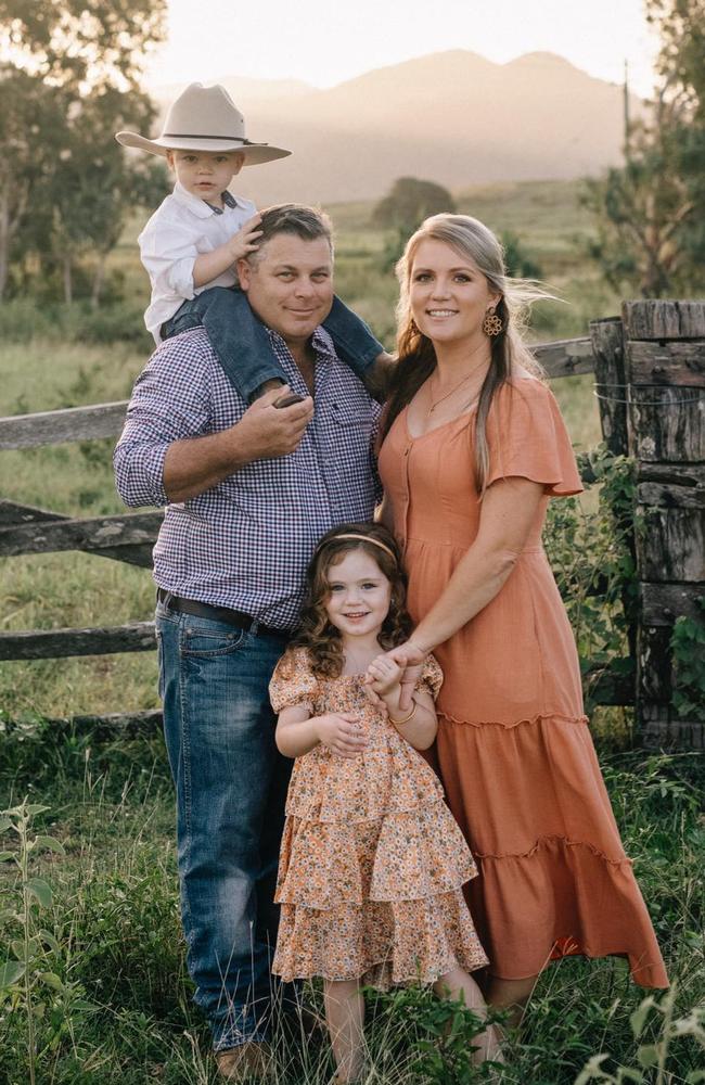 Mel Scriha, her husband and two kids photographed near Seaforth. Picture: Kay Reilly Photography.