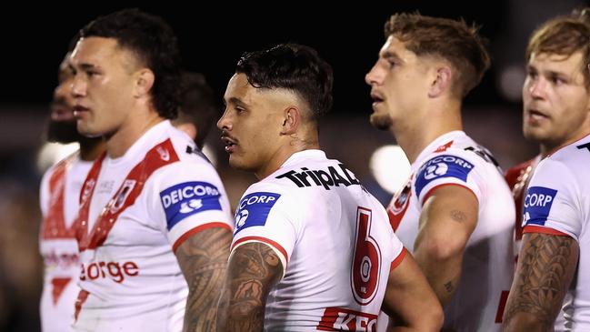 SYDNEY, AUSTRALIA - JUNE 29: Jayden Sullivan of the Dragons and team mates look dejected during the round 18 NRL match between Cronulla Sharks and St George Illawarra Dragons at PointsBet Stadium on June 29, 2023 in Sydney, Australia. (Photo by Cameron Spencer/Getty Images)