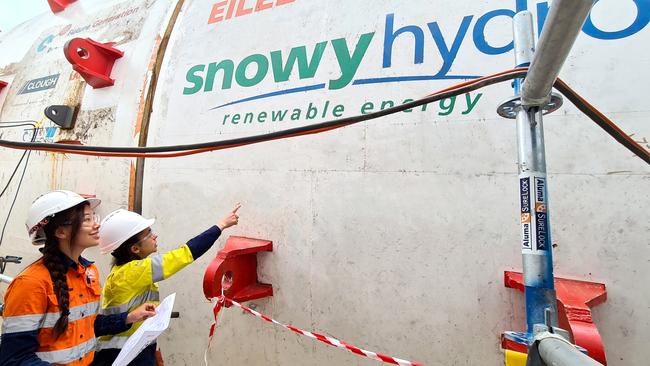 Workers inspect the Snowy 2.0 tunnel boring machine, the Lady Eileen Hudson. Picture: File