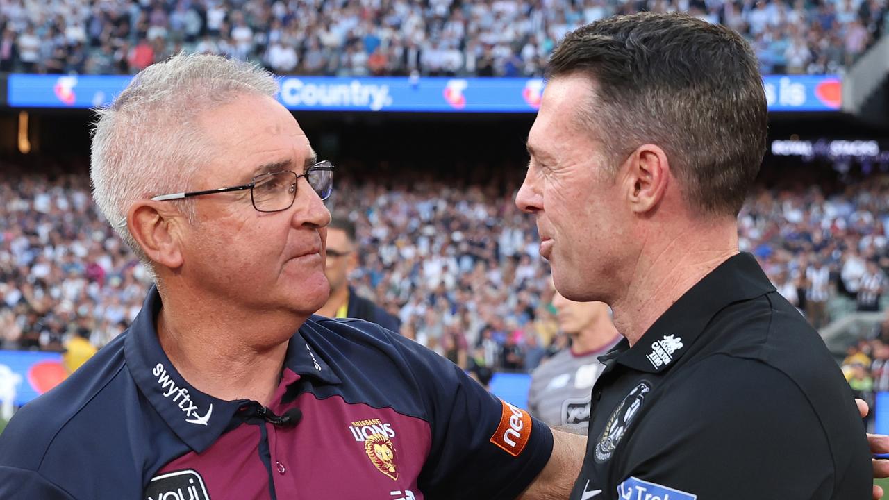 MELBOURNE, AUSTRALIA - SEPTEMBER 30: Lions coach Chris Fagan is acknowledged by Magpies coach Craig McRae during the 2023 AFL Grand Final match between Collingwood Magpies and Brisbane Lions at Melbourne Cricket Ground, on September 30, 2023, in Melbourne, Australia. (Photo by Robert Cianflone/AFL Photos/via Getty Images)