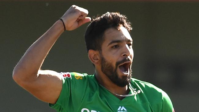 Haris Rauf celebrates one of his five wickets against Hobart Hurricanes.