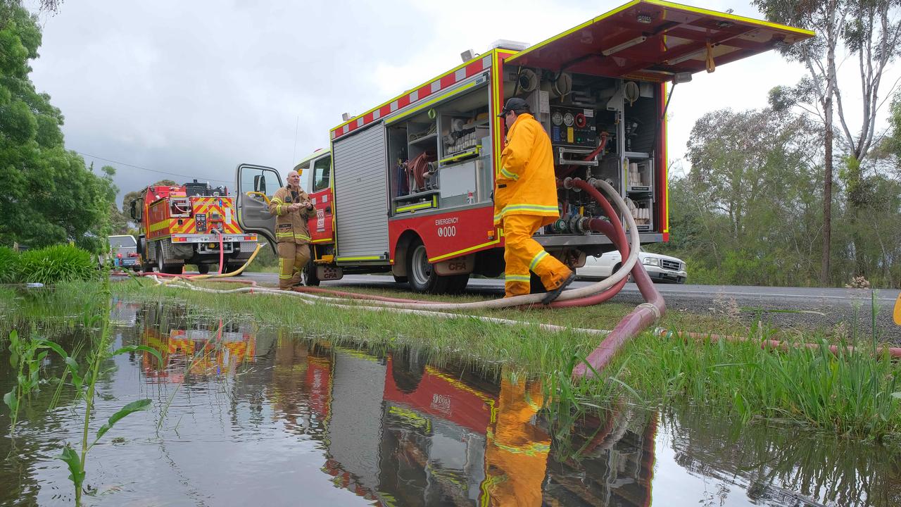 Flooding weather a house on the Hamilton Highway at Murgheboluc needed the CFA Ã&#149;s heavy duty pumps to help to stop the house being inundated with flood water after the heavy rains overnight. Picture: Mark Wilson