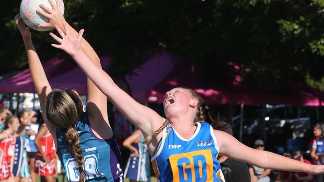 Emma Hinch (right), of NGCNA U15B team. Northern Gold Coast Netball Association (NGCNA) playingHinterland District Netball association  in the u15B's at the carnival held at Hinterland Netball Association Firth Park Mudgeeraba. Picture Glenn Hampson