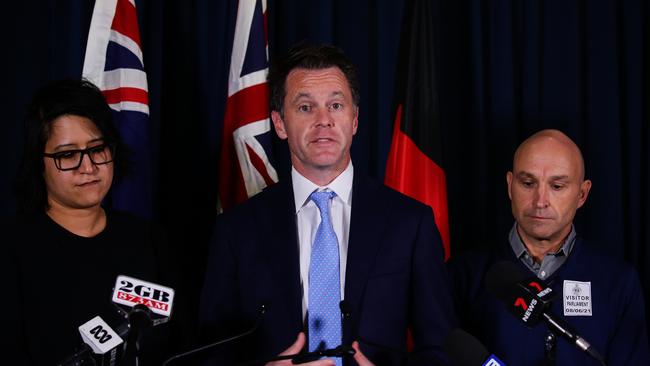 NSW Labor Leader Chris Minns (centre) with paramedic Lani Farrugia (left) and Chris Branson comment on the pay dispute. Picture: NCA NewsWire