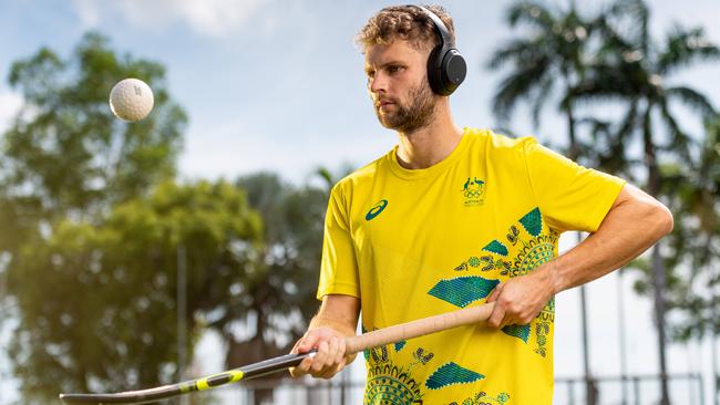 Kookaburras’ defender Josh Beltz warms up with some tunes before a session in the Darwin heat before heading off to Japan for the 2020 Olympics. Picture: Che Chorley