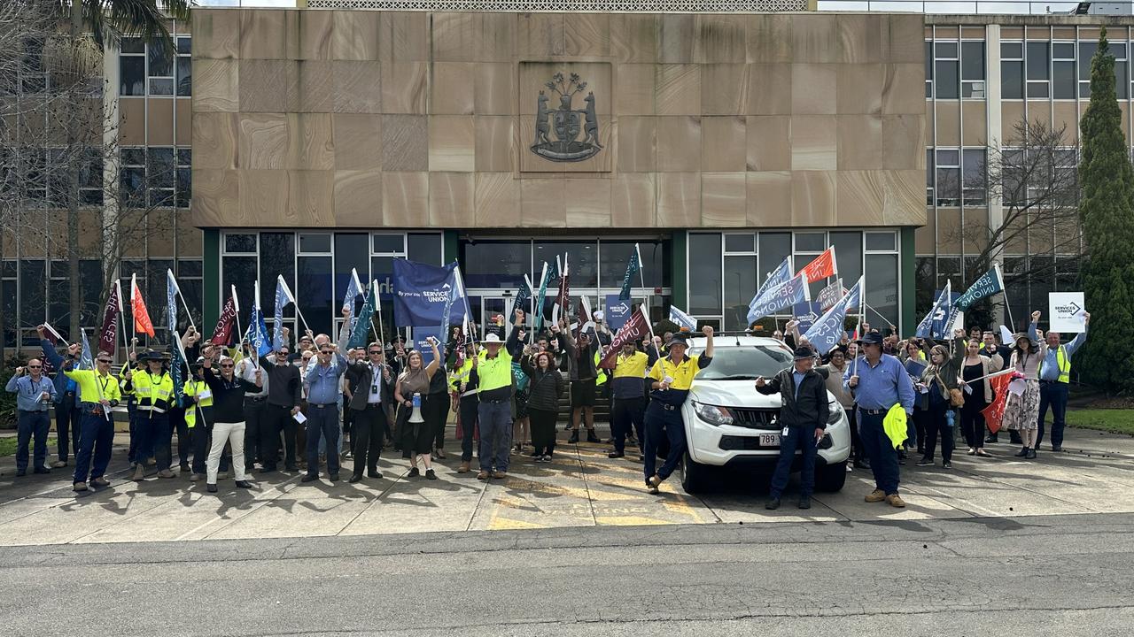 The Services Union organised a stop-work meeting outside city hall to protest against Toowoomba Regional Council, Tuesday, August 20, 2024.