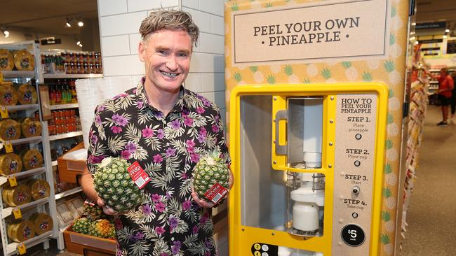 Dave Hughes with the St Kilda pineapple coring machine. Picture: Getty