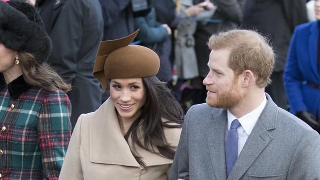 The happy couple on Christmas Day at St Mary Magdalene, Sandringham, Norfolk. Picture: Mega