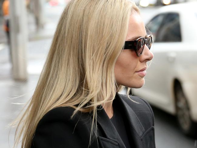 Kelsea Doyle leaves court where her husband Matthew was sentenced to up to eight years in prison. Picture: NCA NewsWire / Damian Shaw