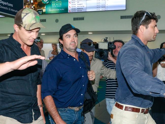 Matt Wright arrives in Darwin flanked by security to present himself to NT Police to face charges relating to the fatal accident that killed his friend and co-star Chris ÃwillowÃ Wilson in February 2022.Picture: Glenn Campbell