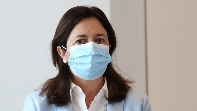 Queensland Premier Annastacia Palaszczuk is seen wearing a mask during a press conference on January 09, 2021 in Brisbane, Australia. Greater Brisbane is under a three-day lockdown until 6 pm on Monday, January 12 after a cleaner working at one of the city's quarantine hotels tested positive for a new variant of the COVID-19 strain that originated in the UK. Picture: Jono Searle/Getty Images.