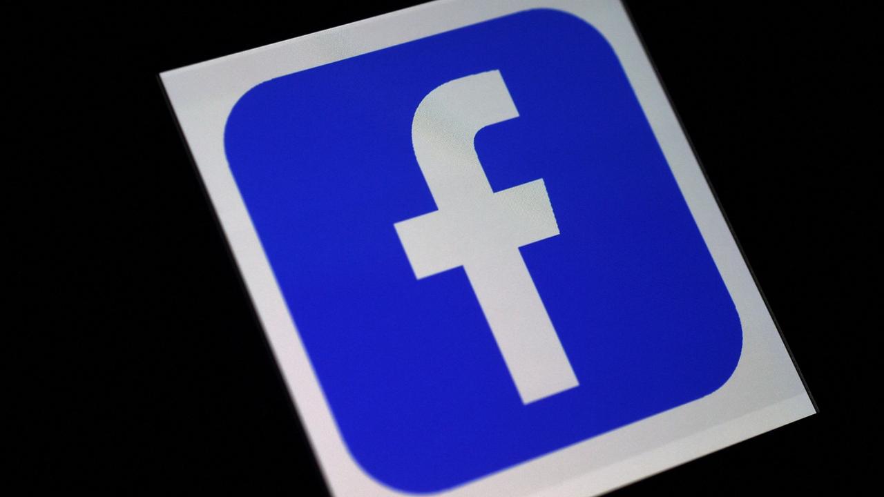 Facebook said it would block news content sharing in Australia. (Photo by Olivier DOULIERY / AFP)