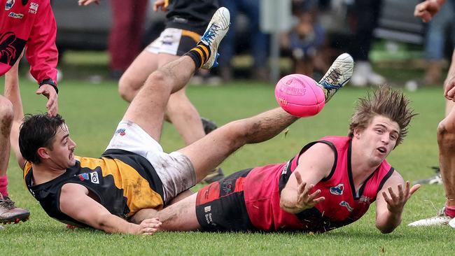 RDFL: Romsey’s Nathan Blair can’t hold the mark. Picture: George Sal